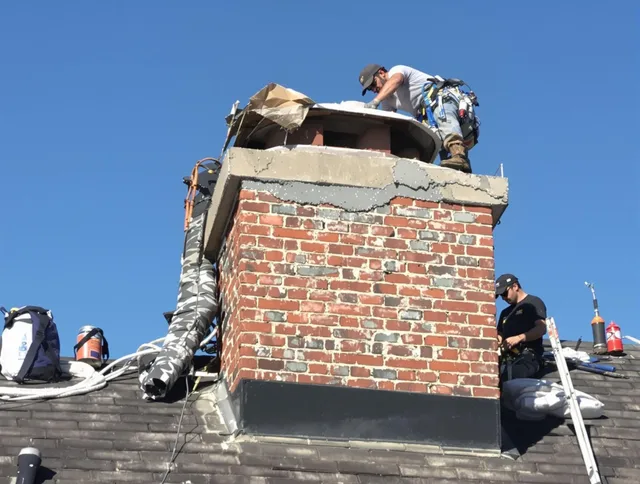 Norwalk Chimney Sweep installing a custom chimney crown in Norwalk, CA