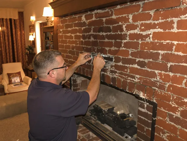 Norwalk Chimney Sweep expert fixing a fireplace in Norwalk, CA